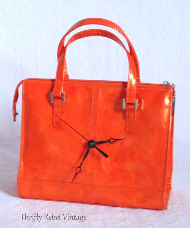 22 diy wall clocks you ll love, Thifty Upcycled Purse Clock