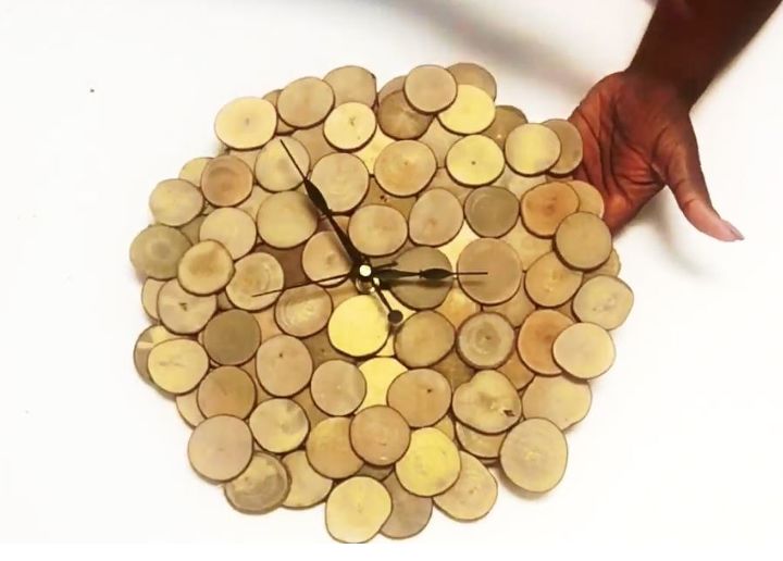 22 diy wall clocks you ll love, Wood Slice Clock