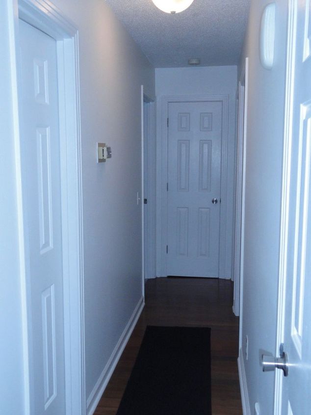 s our favorite before and afters, Banishing the Boring Narrow Hallway