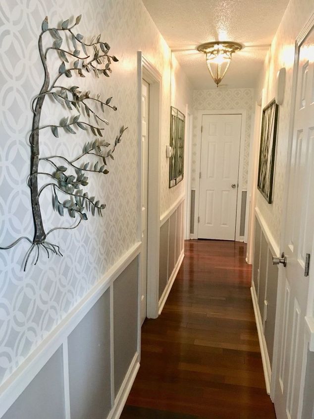 s our favorite before and afters, Banishing the Boring Narrow Hallway