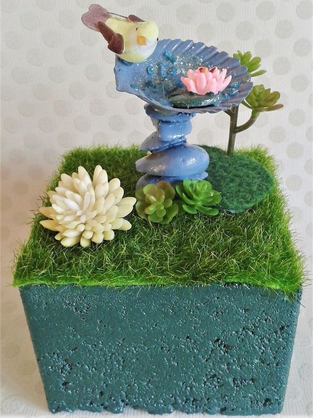 bookend in concrete block garnished with a fairy garden