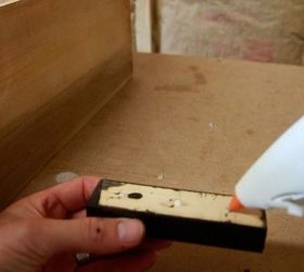 how to restore and old dresser, Hot gluing the drawer pull to the dresser