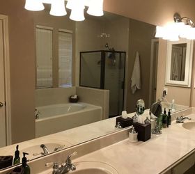 how to you take down a huge builders grade bathroom mirror
