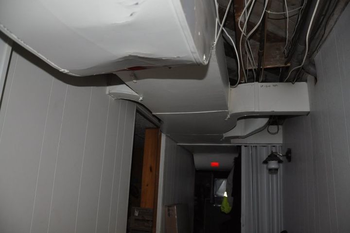 how do i cover low hanging duct work