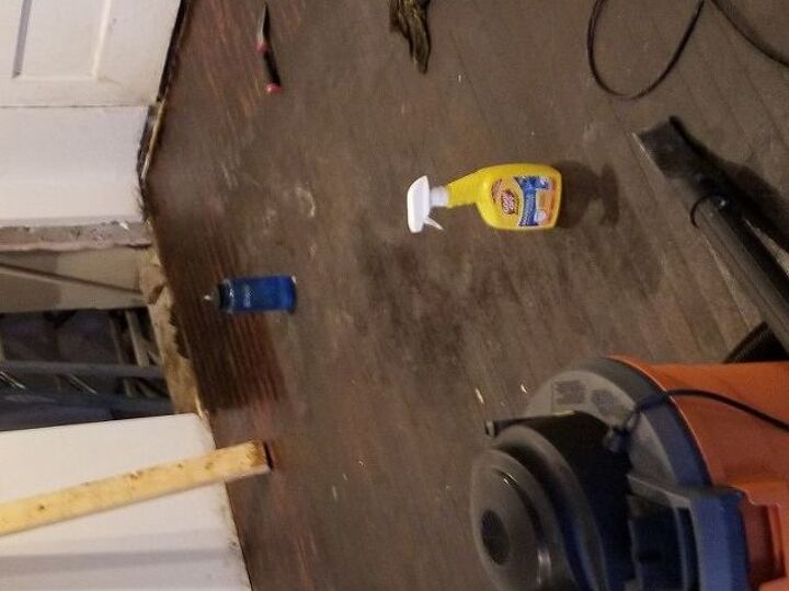 q removing adhesive residue from 70 year old wood floor