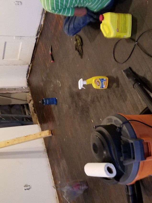 q removing adhesive residue from 70 year old wood floor