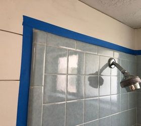 She wraps tape around her shower & it transforms her whole bathroom