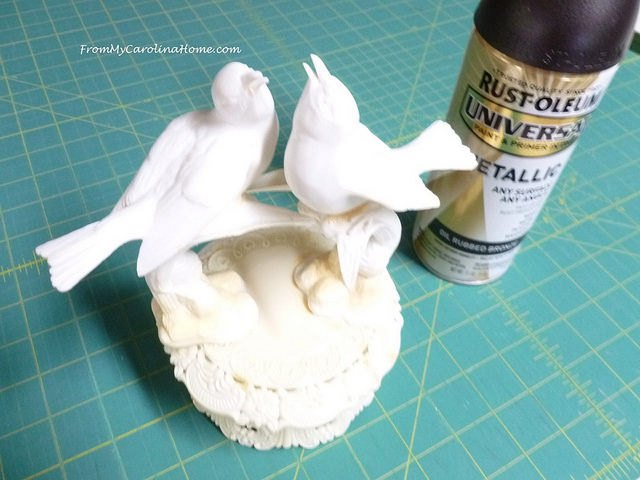 upcycle your wedding cake topper into yard art