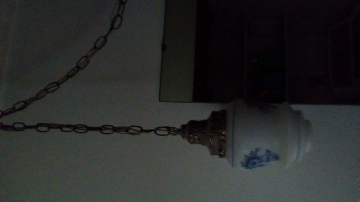 q how do i give a farmhouse look to a double swag light at a bath mirror