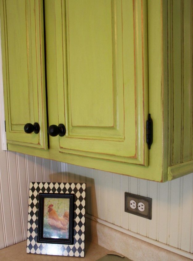 s 16 ways to totally transform your kitchen cabinets today, Kitchen cabinets don t have to be white