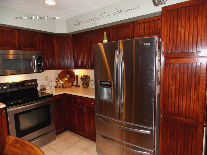 s 16 ways to totally transform your kitchen cabinets today, Yellow Oak Cabinet Transformation
