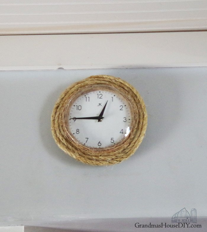 broken clock goes country with twine and rope