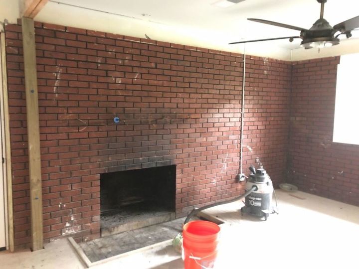 q how do i make this fireplace in the living room even look ok