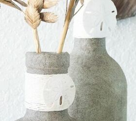 s 31 coastal decor ideas perfect for your home, Repurpose Bottles Into Vases Coated In Sand