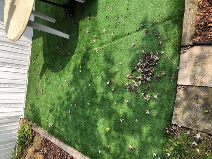 q how do i keep rain from washing debris onto my patio