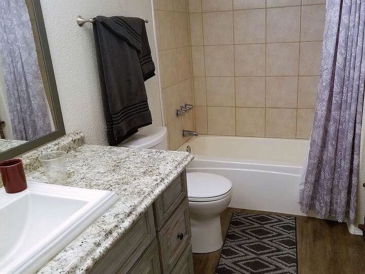 q has anyone had any luck painting shower tile