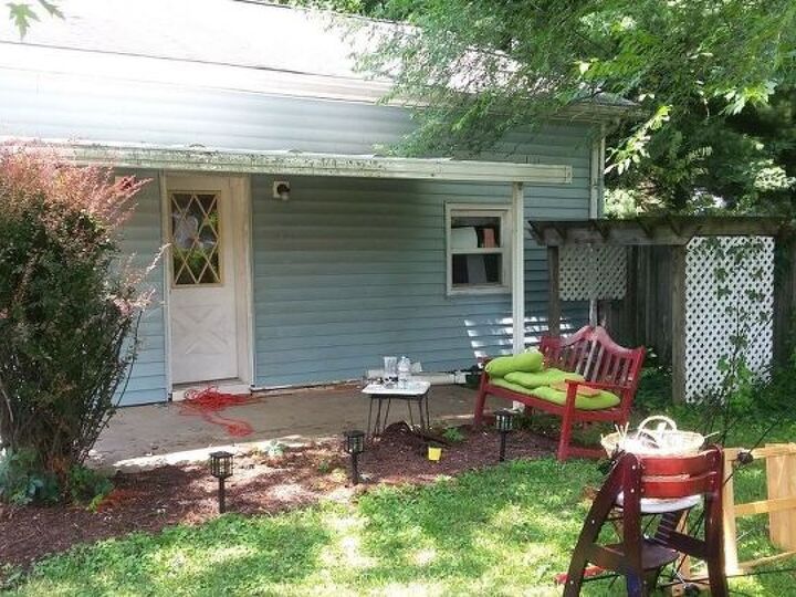 q how do i landscape to make this little patio look more appealing