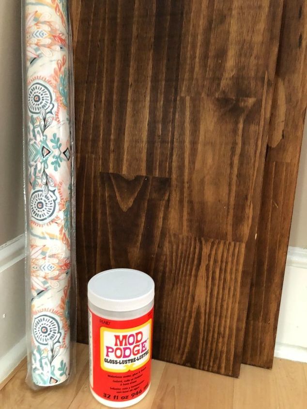 how i dressed up my wood wall shelf with mod podge and gift wrap