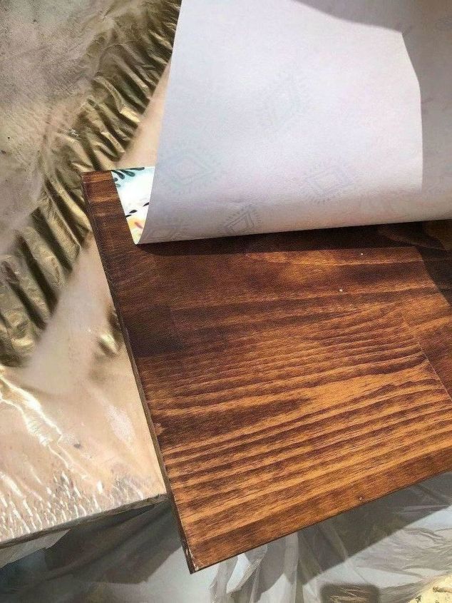 how i dressed up my wood wall shelf with mod podge and gift wrap