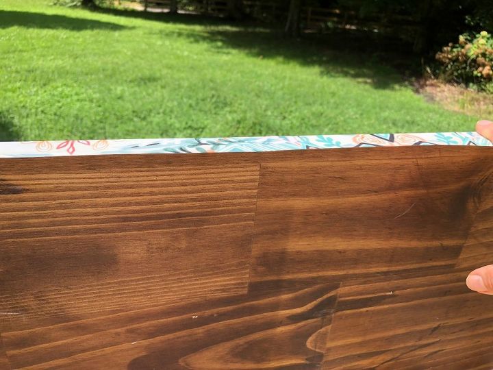 how i dressed up my wood wall shelf with mod podge and gift wrap