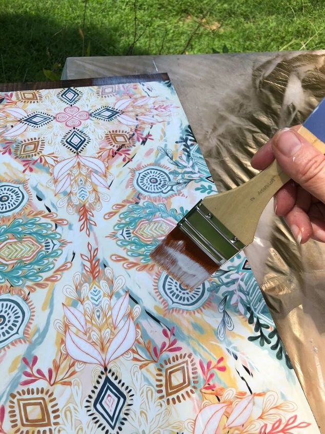 how i dressed up my wood wall shelf with mod podge and gift wrap