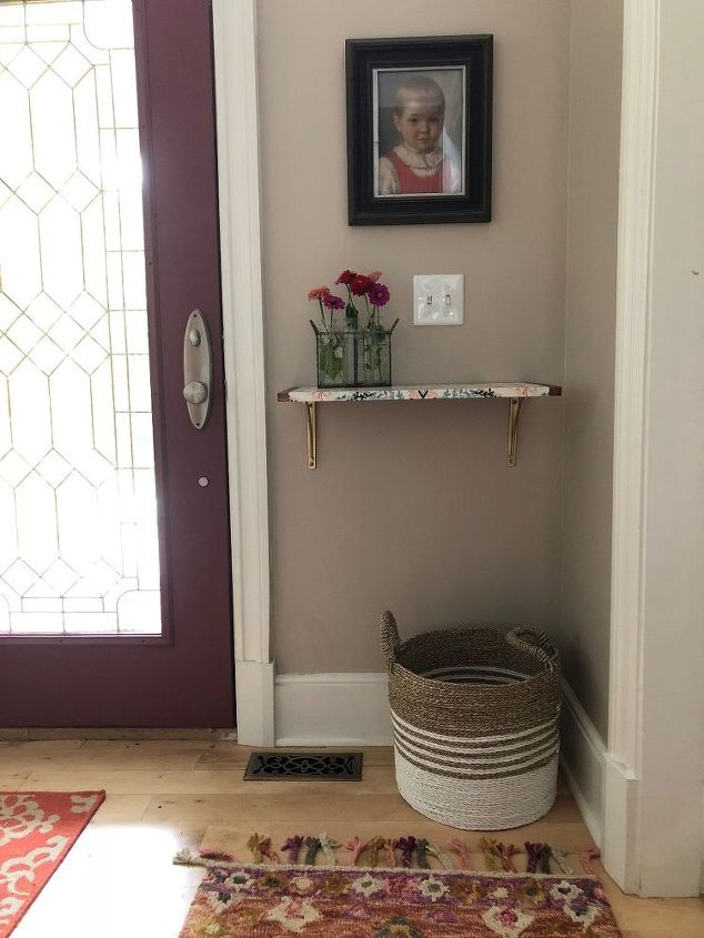 how i dressed up my wood wall shelf with mod podge and gift wrap