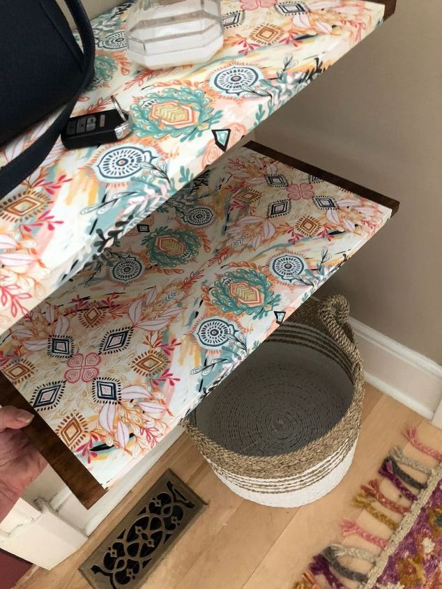 how i dressed up my wood wall shelf with mod podge and gift wrap
