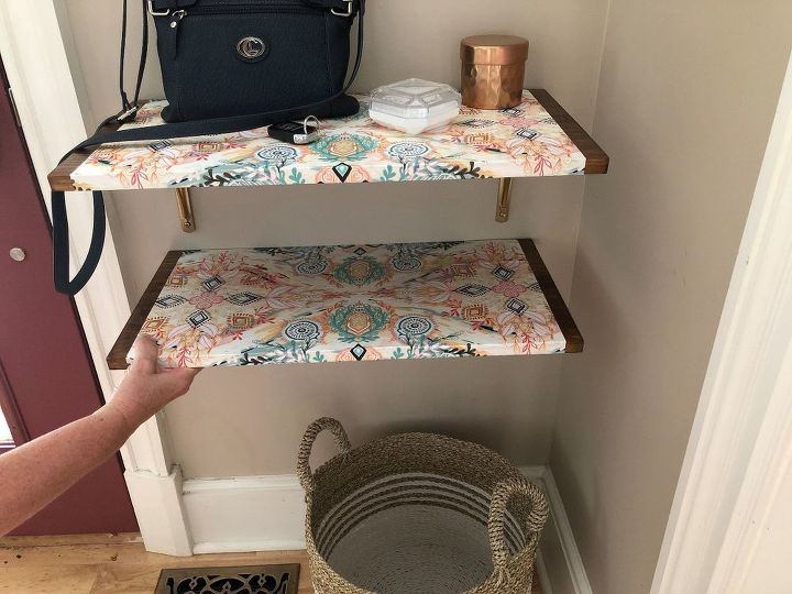 how i dressed up my wood wall shelf with mod podge and gift wrap