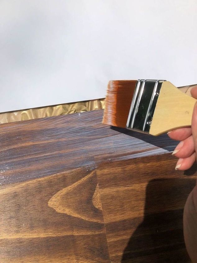 how i dressed up my wood wall shelf with mod podge and gift wrap