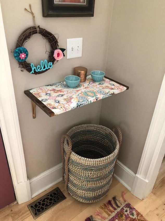 how i dressed up my wood wall shelf with mod podge and gift wrap