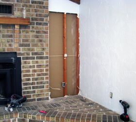 Couple cuts open the wall by their fireplace for this smart reason