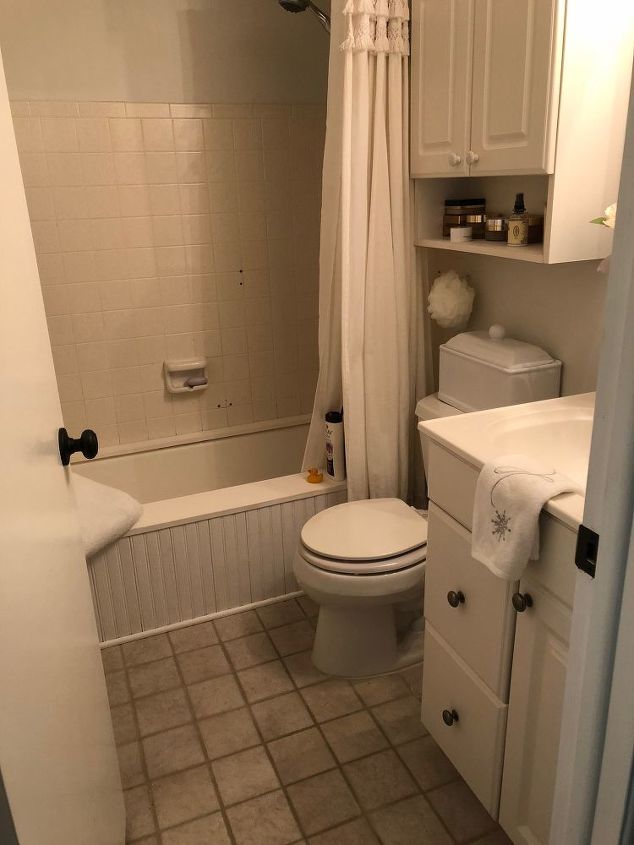 q how can i improve this tiny tiny bathroom