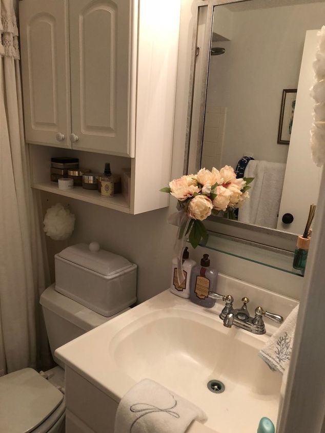 q how can i improve this tiny tiny bathroom