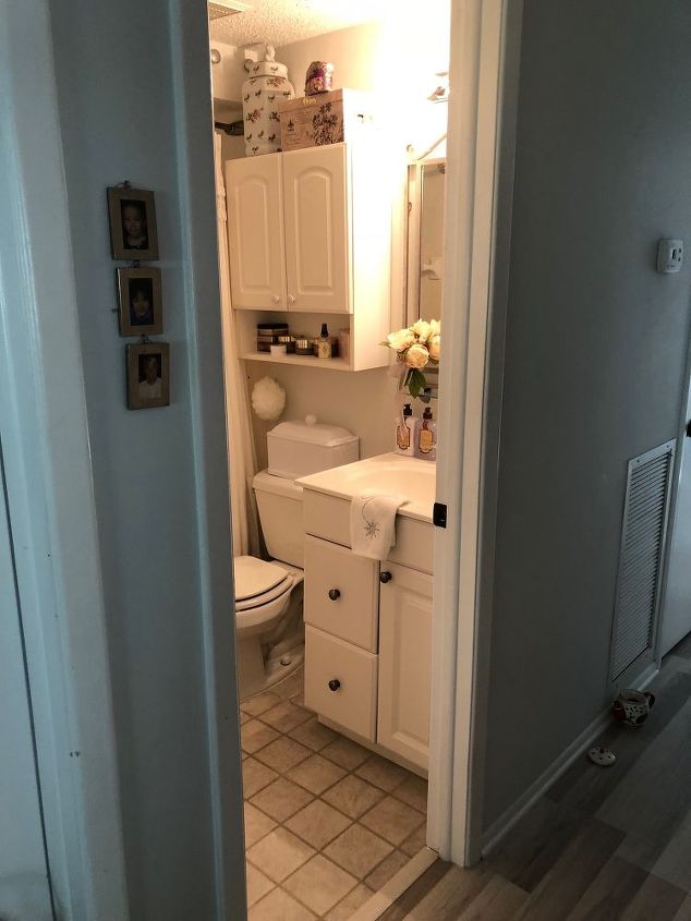 q how can i improve this tiny tiny bathroom