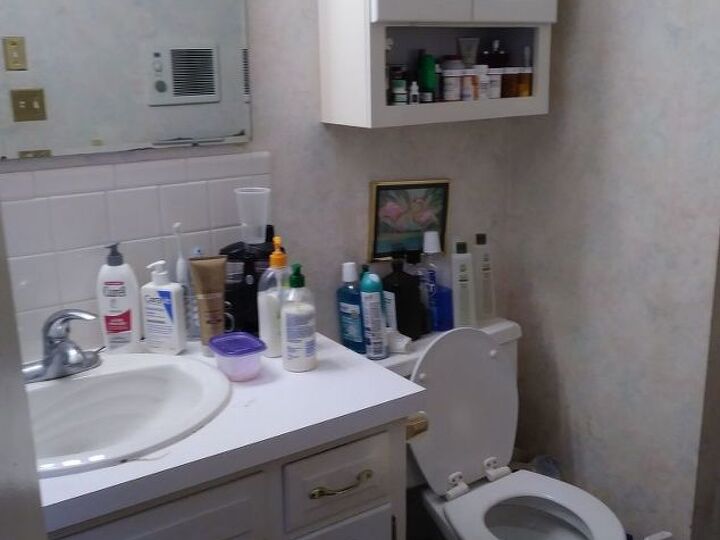 q how to update a small master bathroom on a budget