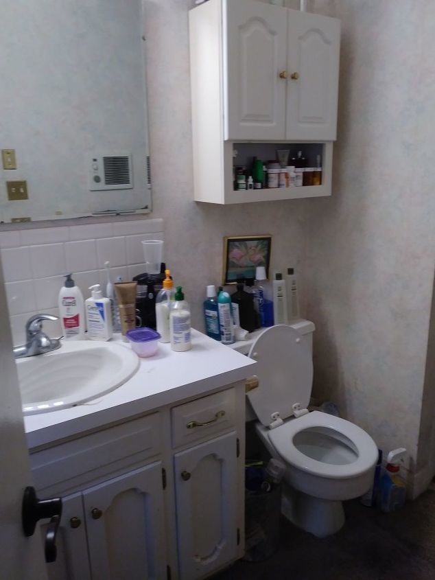 q how to update a small master bathroom on a budget