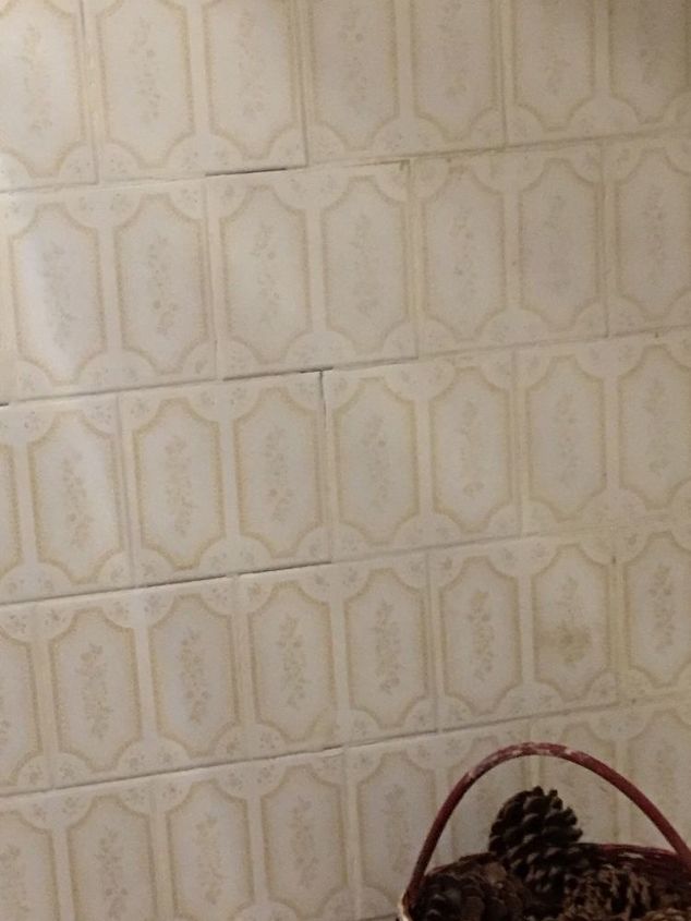 q how can i redo a bathroom no shower ugly tiled half wall