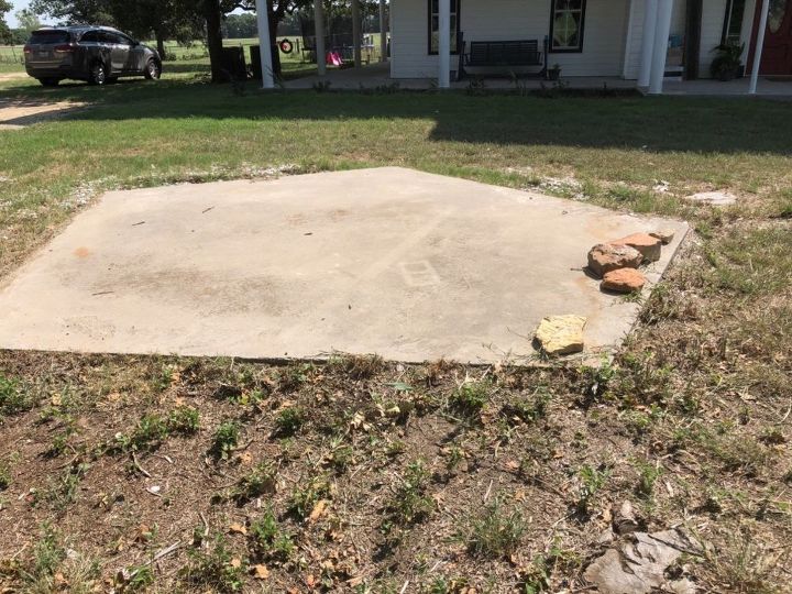 how do i landscape around this slab of concrete in my front yard