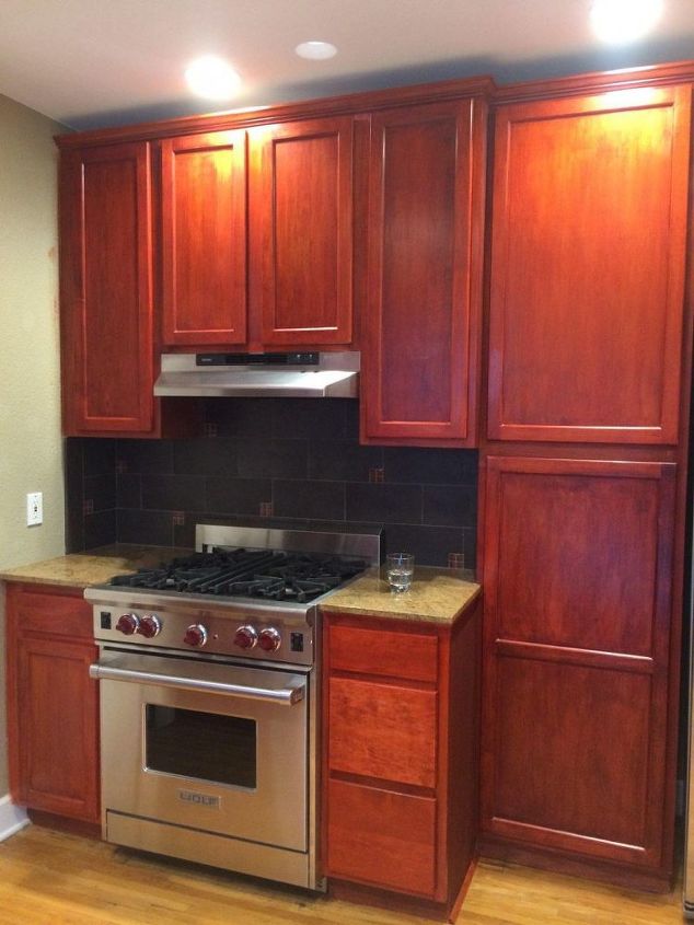 q how to redo this ceiling fan with my red maple cabinets