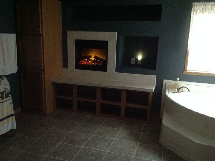 q how can i decorate the holes shown in the pic taken in my bathroom