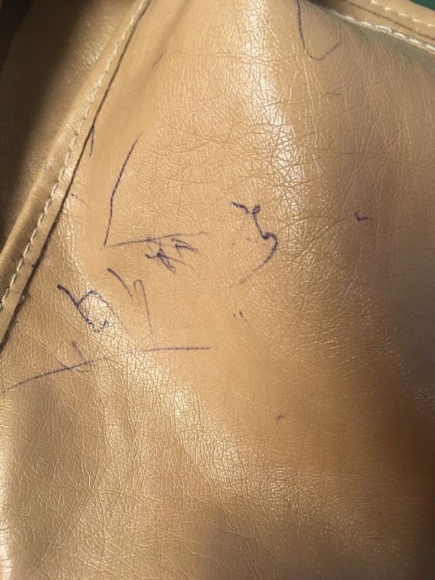 q how do i remove ball point ink from a leather purse