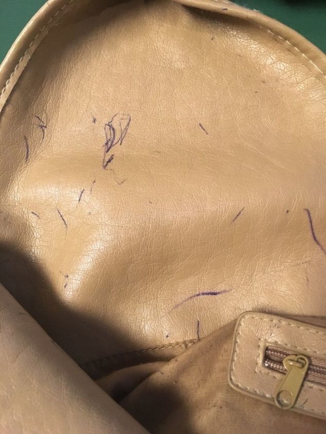 q how do i remove ball point ink from a leather purse