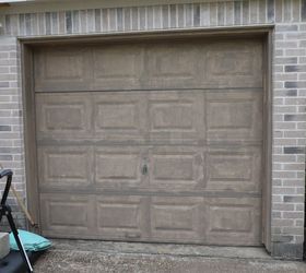 creating a faux wood garage door, One coat of paint and looking worse