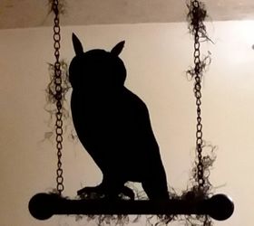 spooky owl on a perch for halloween