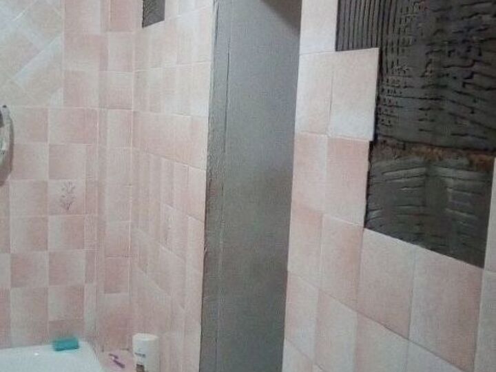 q how can i update this old cold walk in bathroom on a budget