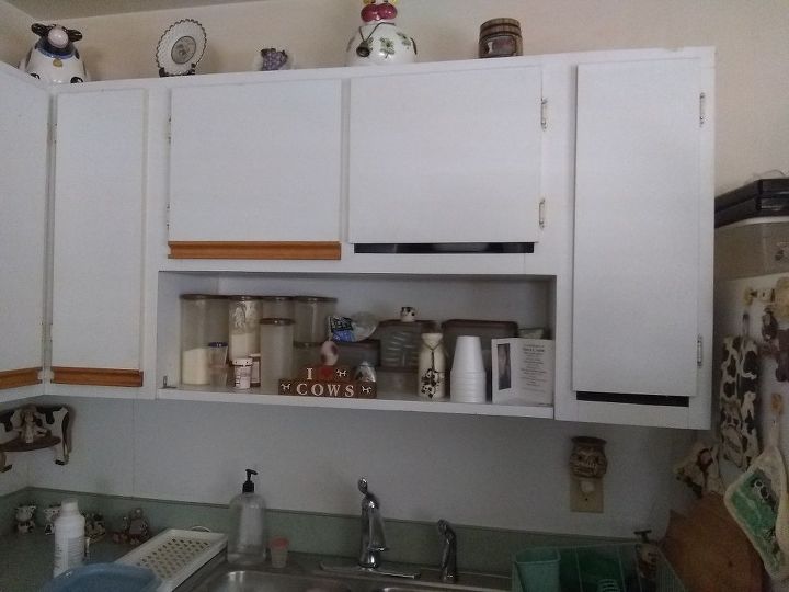 q how do i fix the bottom part of my kitchen cabinets