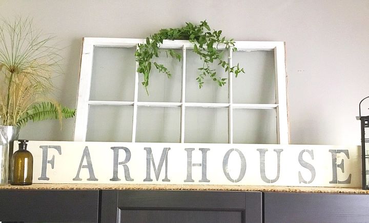 s 18 ways to get the farmhouse kitchen of your dreams, Turn an old window to a classy Farmhouse sign