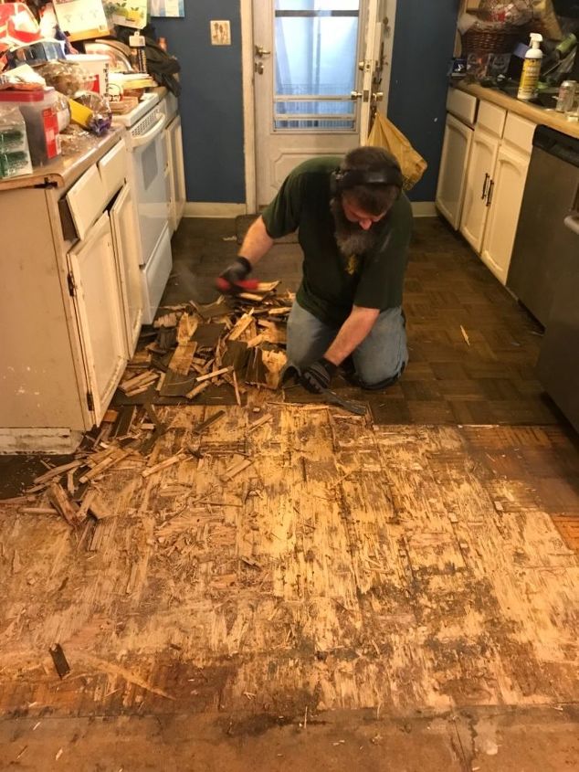 how do i remove wood parquet flooring that is glued down super tight