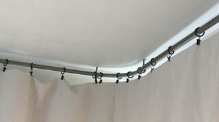 How To Securely Nail Curtain Rod Brackets The Wall