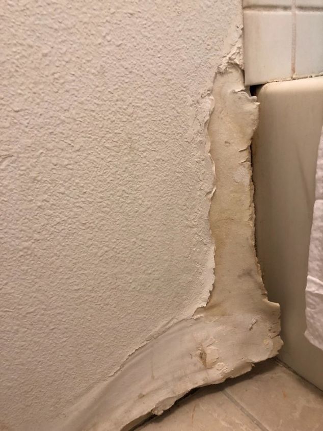 how do i fix a bathroom wall that has peeled off or separated